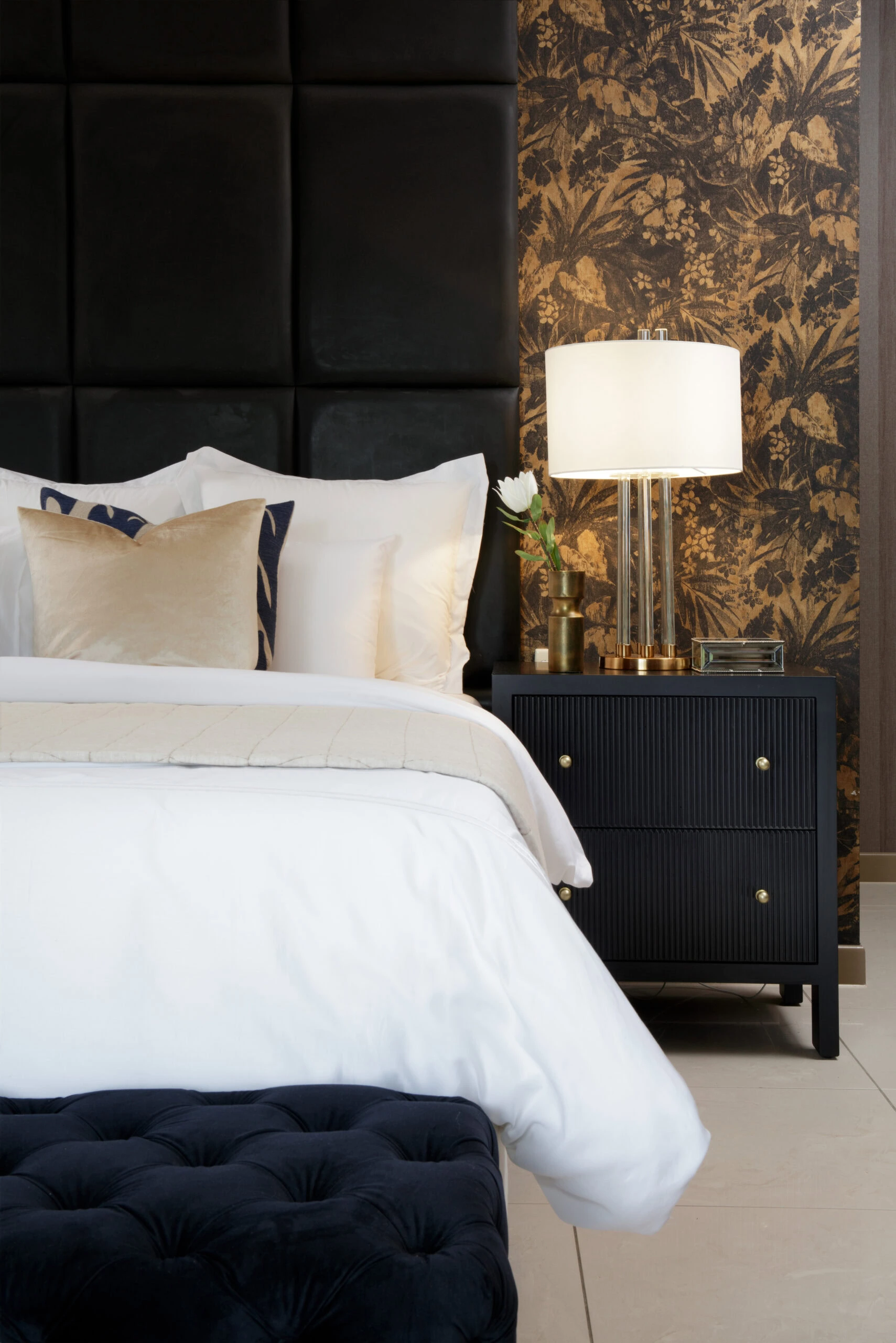 A luxurious bed styled to perfection in a modern home